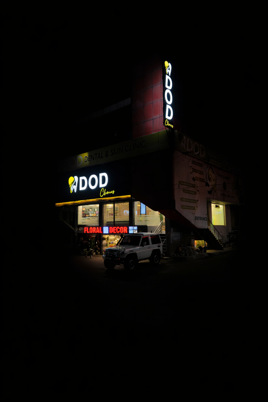 DOD Clinics exterior on Main PWD Road at night